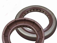 Combined crankshaft rear oil seal assembly